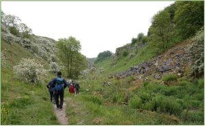 People walking through a valley